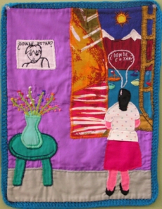 The vivid colors contrast the dark subject of the wall-hanging.  The arpillerista personalizes this arpillera by focusing on one woman who looks out on a beautiful day wondering about the boy in the picture on the wall.
