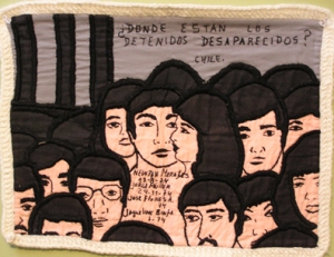 This is a combination of illustrating the group as well as the individual.  The many heads exemplifies the magnitude of disappearances.  The Individual names show that this is personal and that there are specific individuals that the arpillerista 